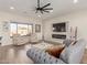Spacious living room with fireplace and large windows at 4966 E Juana Ct, Cave Creek, AZ 85331