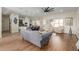 Open living area with hardwood floors, gray sofa, and kitchen views at 4966 E Juana Ct, Cave Creek, AZ 85331