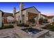 Beautiful backyard featuring a spa, outdoor kitchen, and open patio space for entertaining at 6235 E Montecito Ave, Scottsdale, AZ 85251