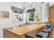 Stylish kitchen features wood cabinets, a large countertop, and stainless steel appliances at 6235 E Montecito Ave, Scottsdale, AZ 85251