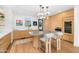 Charming kitchen boasts wood cabinets, a gray countertop, and modern pendant lighting at 6235 E Montecito Ave, Scottsdale, AZ 85251