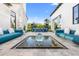 Lush outdoor space with serene water feature, modern seating, and landscape views at 6235 E Montecito Ave, Scottsdale, AZ 85251