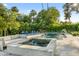Beautiful backyard featuring a stunning pool, spa and elegant water fountains, surrounded by lush landscaping at 6235 E Montecito Ave, Scottsdale, AZ 85251