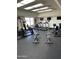 Community fitness center with treadmills, stationary bikes, and weight machines at 625 W Mckellips Rd # 115, Mesa, AZ 85201