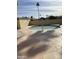 Community hot tub with flagstone patio and surrounding landscaping at 625 W Mckellips Rd # 115, Mesa, AZ 85201