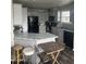 Modern kitchen with gray cabinets and granite countertops at 625 W Mckellips Rd # 115, Mesa, AZ 85201