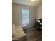 Living room with sectional sofa and home office at 625 W Mckellips Rd # 115, Mesa, AZ 85201