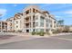 Three-story building with Spanish-style architecture at 7291 N Scottsdale Rd # 2009, Paradise Valley, AZ 85253