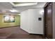 Residential hallway with modern wall art and carpet at 7291 N Scottsdale Rd # 2009, Paradise Valley, AZ 85253