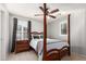 Bedroom with a post bed and nightstand at 739 E Lovebird Ln, Gilbert, AZ 85297