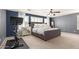 Main bedroom with plush carpeting and an exercise bike at 739 E Lovebird Ln, Gilbert, AZ 85297