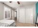 Bedroom with a double bed and large closet at 739 E Lovebird Ln, Gilbert, AZ 85297
