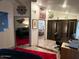 Primary bedroom with large bed and view of living room at 7750 E Broadway Rd # 125, Mesa, AZ 85208