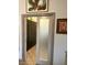 Spacious closet with built-in shelving and frosted glass doors at 7750 E Broadway Rd # 125, Mesa, AZ 85208