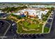 Community clubhouse with putting green and parking at 7750 E Broadway Rd # 125, Mesa, AZ 85208