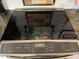 Stainless steel cooktop with digital controls at 7750 E Broadway Rd # 125, Mesa, AZ 85208