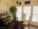 Casual dining area with bar and seating for four, great for entertaining at 7750 E Broadway Rd # 125, Mesa, AZ 85208