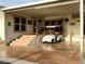 Home exterior with covered carport and golf cart at 7750 E Broadway Rd # 125, Mesa, AZ 85208