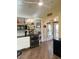 Modern kitchen with updated appliances and wood flooring at 7750 E Broadway Rd # 125, Mesa, AZ 85208
