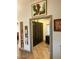 Home office with dark wood built-ins and wood flooring at 7750 E Broadway Rd # 125, Mesa, AZ 85208