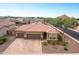 Aerial view of house with solar panels and driveway at 809 W Palo Verde Dr, Casa Grande, AZ 85122