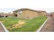 Large grassy backyard with a partially visible patio at 809 W Palo Verde Dr, Casa Grande, AZ 85122