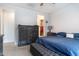 Spacious bedroom with dresser and large bed at 809 W Palo Verde Dr, Casa Grande, AZ 85122
