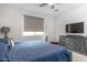 Bright bedroom with a large bed and TV at 809 W Palo Verde Dr, Casa Grande, AZ 85122