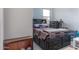 Cozy bedroom with a queen-size bed and storage at 809 W Palo Verde Dr, Casa Grande, AZ 85122