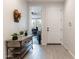 Bright entryway with wood-look tile flooring and a console table at 809 W Palo Verde Dr, Casa Grande, AZ 85122