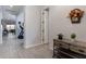 Light and airy hallway with wood-look tile flooring at 809 W Palo Verde Dr, Casa Grande, AZ 85122