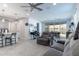 Open living room with comfortable seating and access to kitchen and dining area at 809 W Palo Verde Dr, Casa Grande, AZ 85122