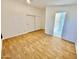 Bedroom with laminate flooring and double door closet at 8500 E Southern Ave # 405, Mesa, AZ 85209