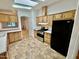 Kitchen boasts stainless steel appliances and ample wood cabinets at 8500 E Southern Ave # 405, Mesa, AZ 85209