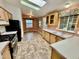 Kitchen with light wood cabinets, tile floor and stainless steel appliances at 8500 E Southern Ave # 405, Mesa, AZ 85209