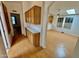 Kitchen with wood cabinets and laminate flooring at 8500 E Southern Ave # 405, Mesa, AZ 85209