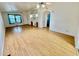 Living room with wood-look floors and ceiling fan at 8500 E Southern Ave # 405, Mesa, AZ 85209