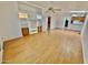 Bright living room with wood-look floors and built-in shelving at 8500 E Southern Ave # 405, Mesa, AZ 85209