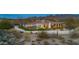 Luxury backyard with private pool, covered patio, mountain views, and desert landscaping at 9045 E Chino Dr, Scottsdale, AZ 85255