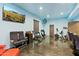 Home gym with exercise equipment and airplane seats at 9045 E Chino Dr, Scottsdale, AZ 85255