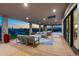 Relaxing outdoor living space includes covered patio with modern furniture, an outdoor dining area, and scenic views at 9045 E Chino Dr, Scottsdale, AZ 85255