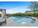 Stunning pool with mountain views and a shaded seating area at 9045 E Chino Dr, Scottsdale, AZ 85255