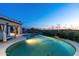Beautiful swimming pool with desert views, relaxing lounge area and covered patio at 9045 E Chino Dr, Scottsdale, AZ 85255