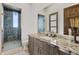 Modern bathroom with granite countertop and large walk-in shower at 9127 N Fireridge Trl, Fountain Hills, AZ 85268