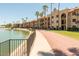Building exterior with lake view and walking path at 10330 W Thunderbird Blvd # A125, Sun City, AZ 85351