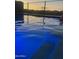 Inviting blue pool at sunset, perfect for summer fun at 12730 W Glenn Dr, Glendale, AZ 85307