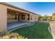 Landscaped backyard with artificial turf and gravel at 12750 W Jasmine Trl, Peoria, AZ 85383