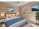 Cozy bedroom featuring neutral tones and ample natural light at 12750 W Jasmine Trl, Peoria, AZ 85383
