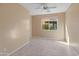 Charming bedroom with a large window and tile floor at 12750 W Jasmine Trl, Peoria, AZ 85383