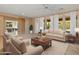 Bright living room with hardwood floors and comfortable seating at 12750 W Jasmine Trl, Peoria, AZ 85383